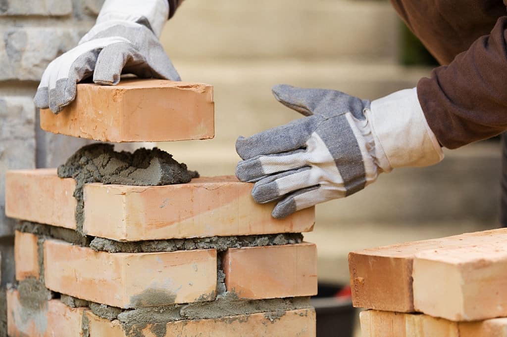 Chimney repair worker